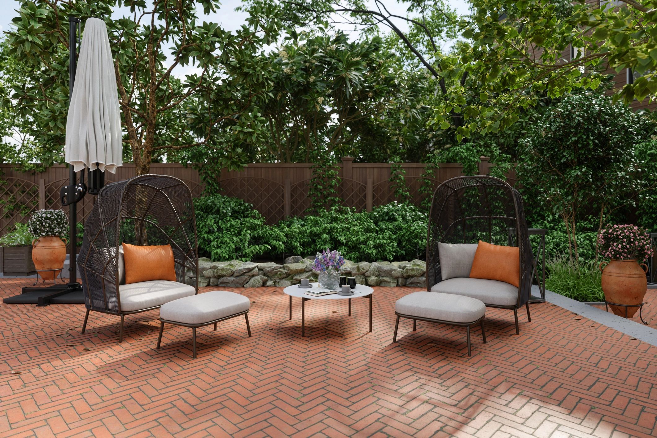 Backyard patio with umbrella, seating, and garden plantings